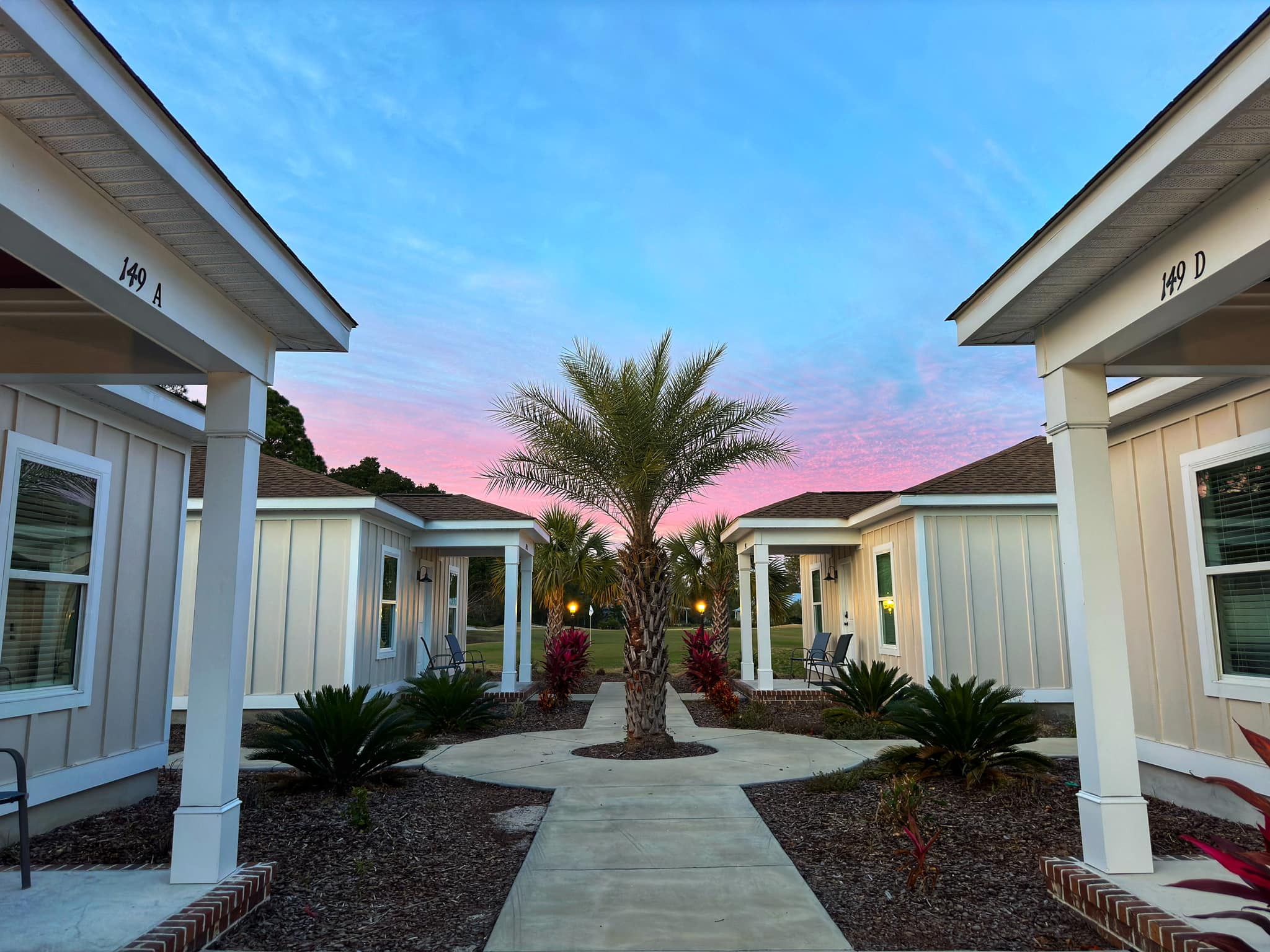 The Clubhouse Villas at St. James Bay around their courtyard at sunset